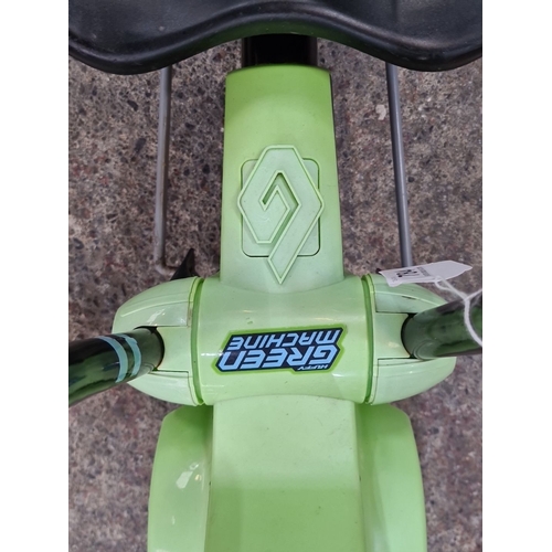 784 - Huffy Green Machine three-wheeled pedal-powered ride-on. Features lime green accents, dual handle co... 