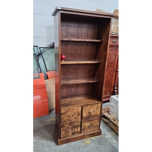 791 - Star lot : A Next Interiors,  Tall wooden bookshelf with four shelves and four drawers. Rich brown f... 