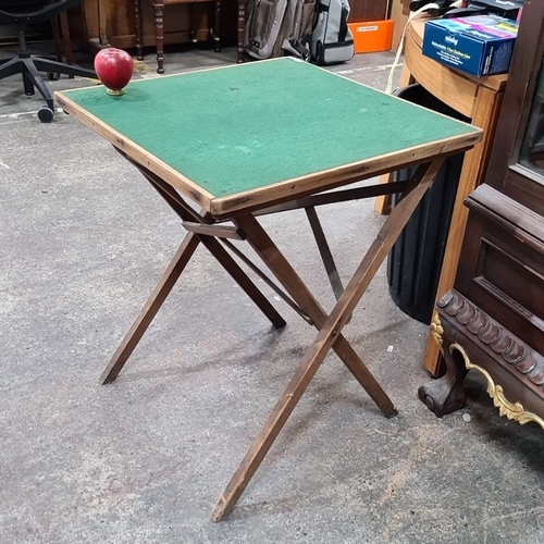 797 - Folding wooden card table with green felt top. Compact and easy to store.