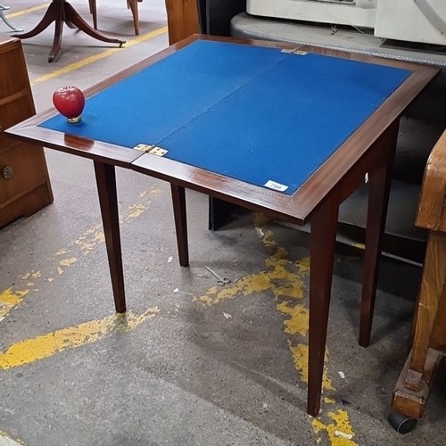 798 - Star lot : Folding card table with green baize top and mahogany frame, likely mid-20th century.