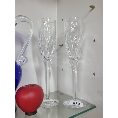 874 - A gorgeous pair of John Rocha for Waterford Crystal champagne flute glasses. Both in good condition ... 