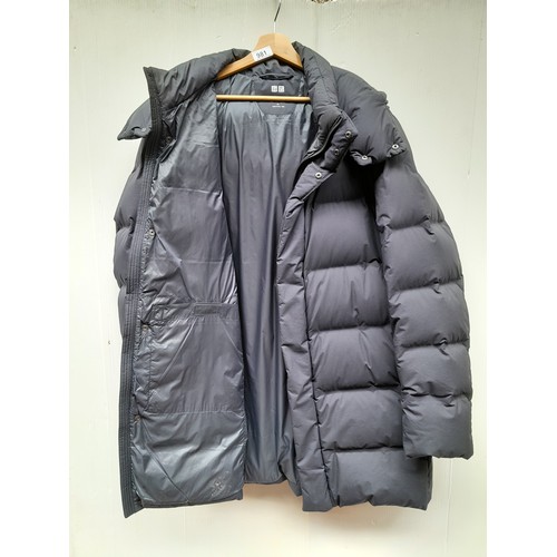 981 - A mens Uniqlo  down feather puffer jacket. Light weight, windproof and durable water repellent fabri... 