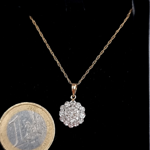 1002 - Star Lot: A very beautiful 9 carat gold and diamond clustered pendant necklace, stamped 375 and test... 