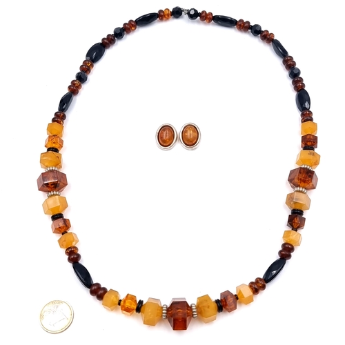 1003 - A nice jewellery set of Amber clip on earrings and Chunky necklace. Comes with a nice jewellery box.... 