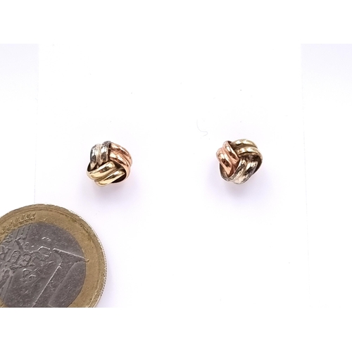 1007 - A pair of twist stud earrings with 9 carat gold 375 backs. Boxed.
Total Weight:0.85 grams