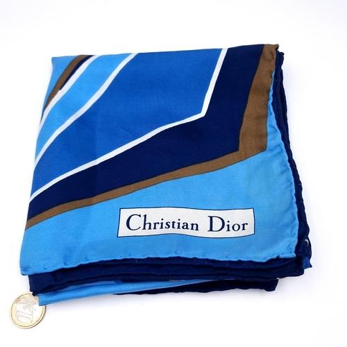 1025 - A blue Designer Silk square neck scarf by the famous French design house.  'Christian Dior'.