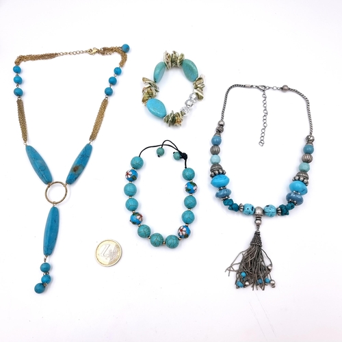 1032 - A mixed lot of Boho Turquoise  jewellery including two necklaces together with two bracelets. Some n... 