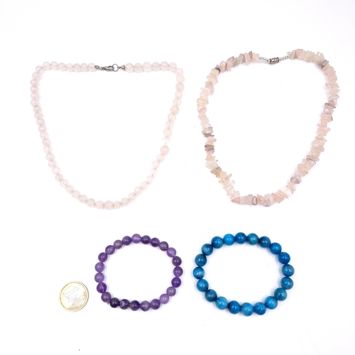 1036 - Two Rose quartz necklaces along with a blue apatite and amethyst bracelet.