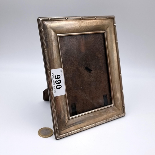 990 - A sterling silver 925 stamped picture frame with hallmarks to Sheffield. 
Interior measurement: 8.5 ... 