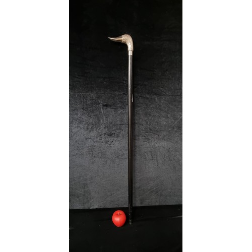 875 - A black gentleman's stick with duck head handle