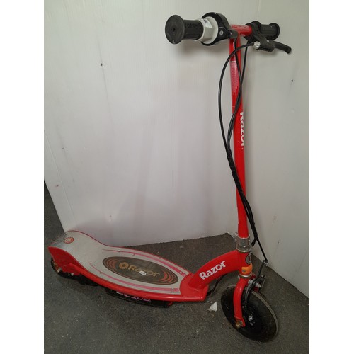 968 - A red Razor electric childrens two wheel push scooter, heavy good quality no charger.  €260 new