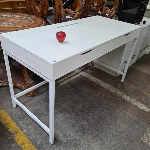 935 - A white wooden desk with two pull out drawers and a hinged desk lid  for hiding cables. 150 Euro ret... 