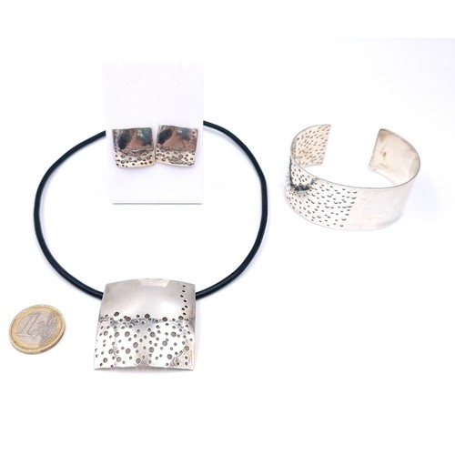 1041 - A lovely sterling silver Three piece Jewellery set. Including a necklace, a bangle and square stud. ... 