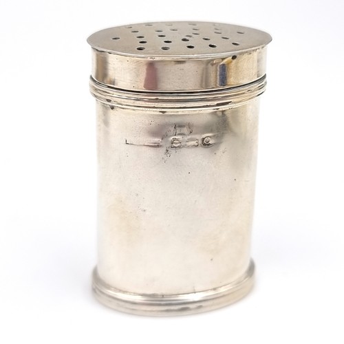 7 - A pretty sterling silver pepper cannister hallmarked Birmingham. Dimensions: Lid - 3 x 2 cms. Height... 