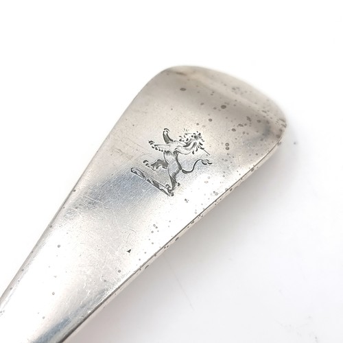 16 - A hallmarked Sheffield large sterling silver serving spoon. Length - 22 cms. Bowl - 8 x 4.5 cms. Wei... 