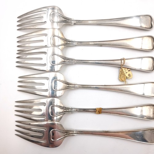 18 - A collection of six forks with fiddle pattern handles marked sterling and hallmarked Birmingham. Len... 