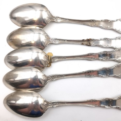 20 - A collection of six silver teaspoons. Length of spoons - 14 cms. Weight - 159 grams.