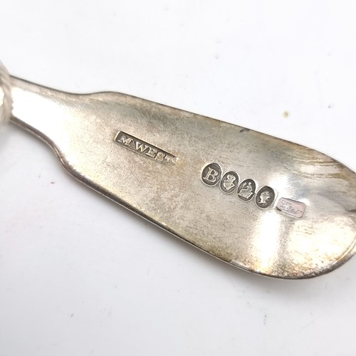 24 - A most attractive fiddle pattern handle caddy spoon hallmarked Dublin - 1882. Length - 15 cms. Weigh... 