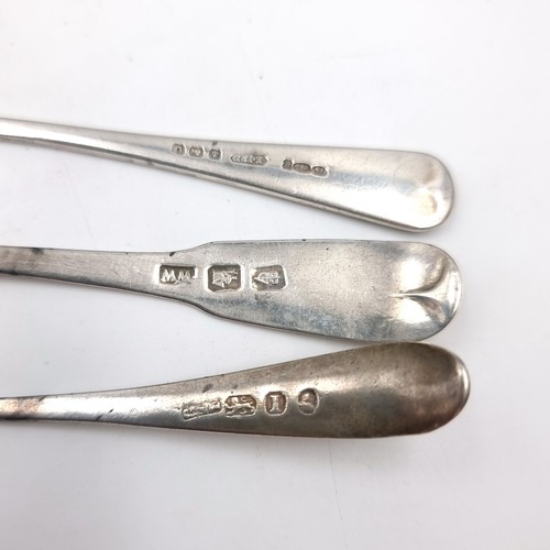 29 - A collection of three Irish spoons. Two with Sterling Silver  UK hallmarks together with an Irish si... 