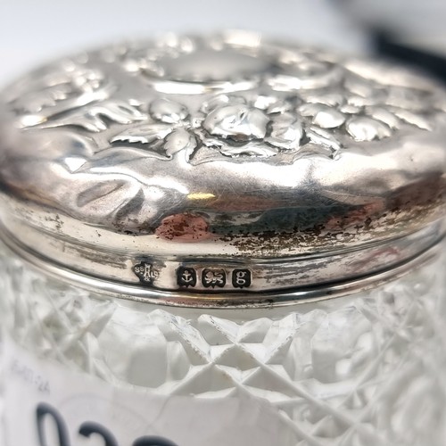 32 - A hob nail cut glass dressing table jar with sterling silver topped lid hallmarked Birmingham. Lid w... 