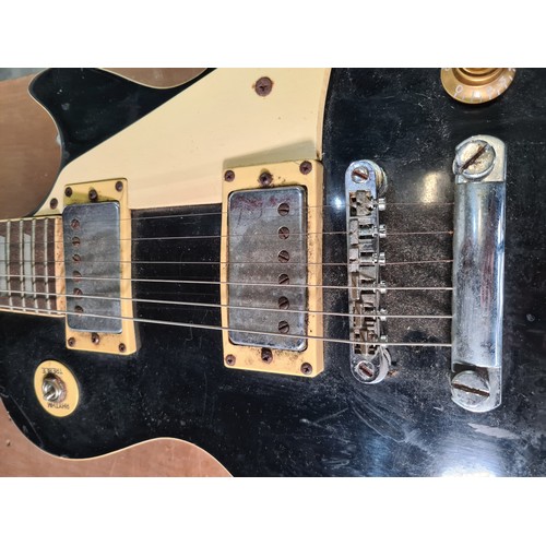 123 - Star Lot : A vintage collectible original Gibson Les Paul Electric Guitar in ebony finish.