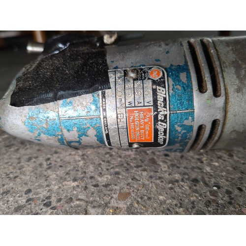 856 - A Black & Decker 110mm heavy duty holgun drill no. HD1060. Together with a 110v transformer. Need to... 