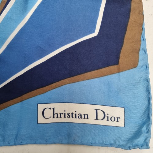 1025 - A blue Designer Silk square neck scarf by the famous French design house.  'Christian Dior'.