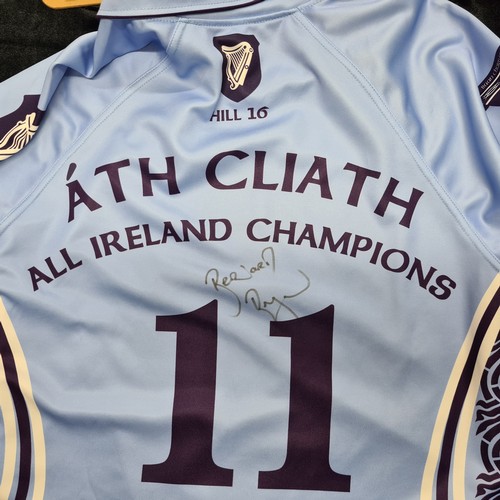 880 - 7 pieces of Dublin GAA memorabilia including a 2011 All Ireland Champions shirt signed by Bernard Br... 