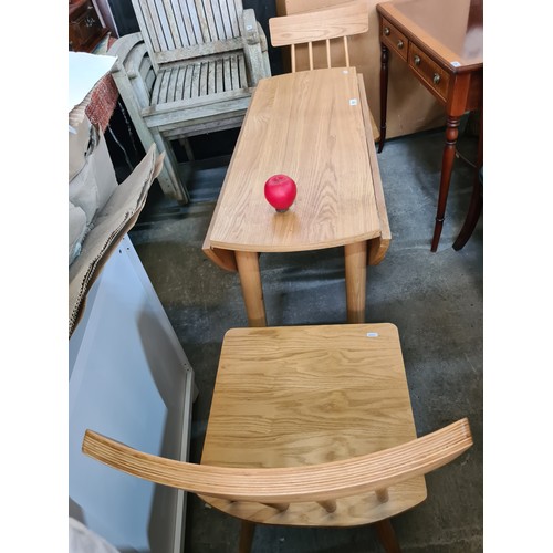 961 - A lovey wooden Scandinavian style breakfast table along with two coordinating chairs. Super conditio... 