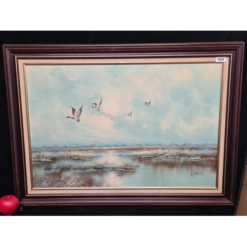 69 - A large original mid 20th century oil on canvas painting. Features Mallard ducks in flight across a ... 