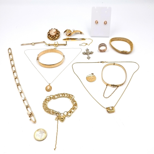 27 - An interesting collection of vintage gold plated and gold toned jewellery consisting of bracelets, b... 