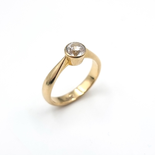 3 - A nine carat gold heavy Moissanite gemstone ring. Stone - 0.5 carats. Ring size - P. Weight - 3.9 gr... 