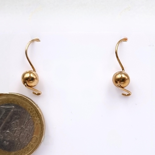 45 - A pair of nine carat gold (375) ball set earrings suitable for pierced ears. Total weight - 0.82 gra... 