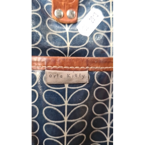 641 - Orla Kiely tote bag with signature stem print pattern and black leather handbag with silver-tone har... 