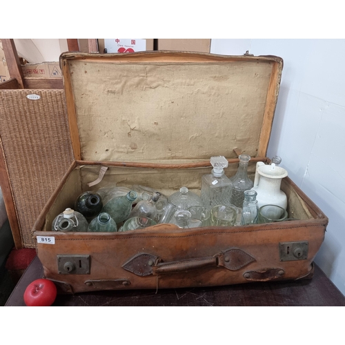 815 - An antique trunk containing an interesting selection of vintage glassware