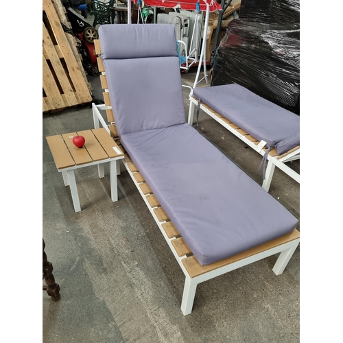 871 - An excellent example of an 'Out Sunny' metal framed wood slatted outdoor lounge chair with adjustabl... 