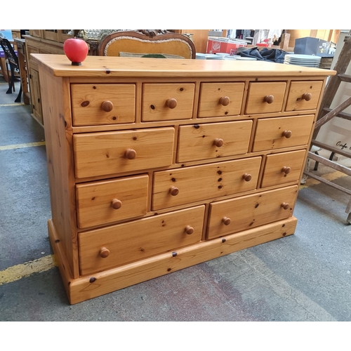 887 - Star lot : A large heavy multi drawer chest of drawers comprising of 13 drawers in total. In good or... 