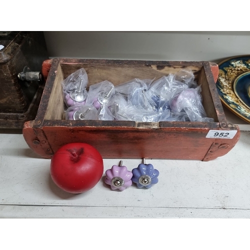 952 - A vintage wooden box containing 12 very decorative ceramic drawer knobs in lavender and purple hues ... 