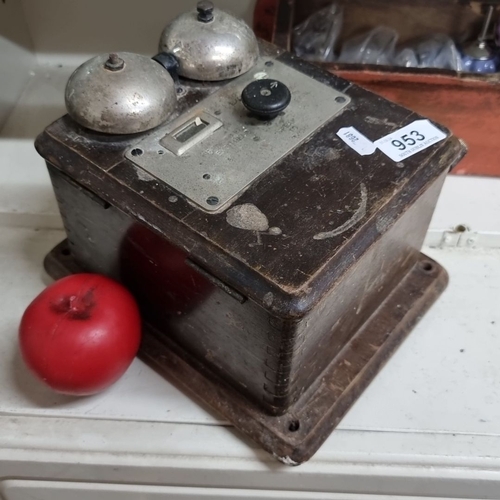 953 - An early 20th-century telephone wall-mounted ringer box. Features dual metal bells and a wooden case... 