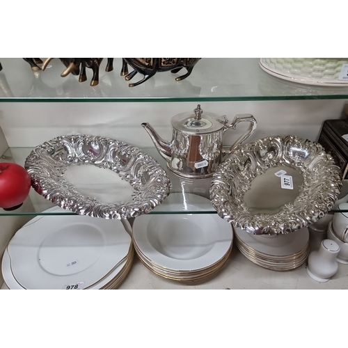 977 - Three silver-plated items including a teapot and two ornate serving trays. The teapot is marked 'EPB... 