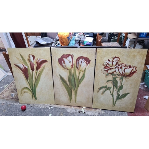 893 - A series of three large prints on canvas. Features botanical study of flowers in shades of red and g... 