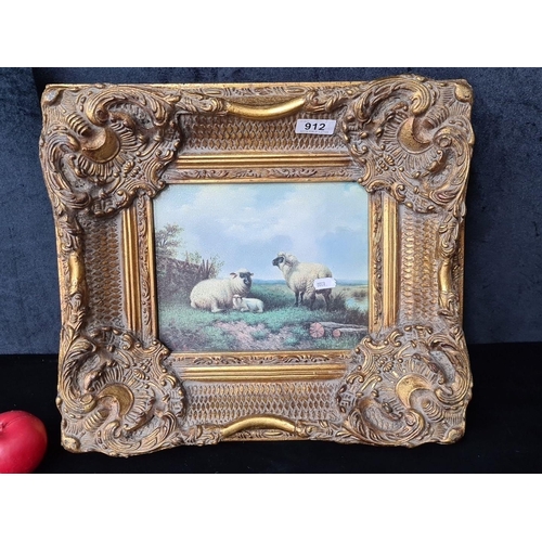 912 - A charming quality print on board. Features a Countryside landscape scene with sheep. Housed in an o... 