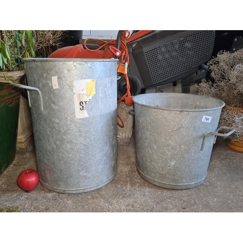 764 - Two large galvanised steel buckets with handles to either side.