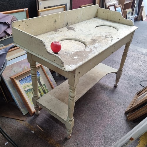 873 - An early 20th century large Wash stand with turned wood legs along with a shelf beneath. Ready for p... 