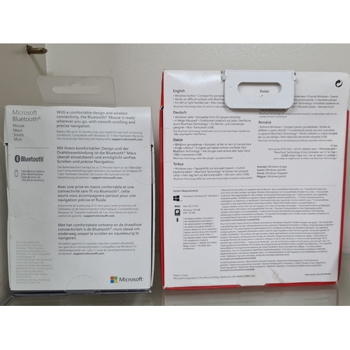 945 - Two boxed Microsoft mice: one Bluetooth Mouse with wireless connectivity and one Sculpt Mobile Mouse... 