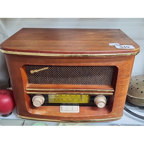 949 - A Roadstar radio with a vintage-style integrated CD player. It has a wooden exterior with brass trim... 