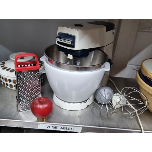 1001 - A heavy Kenwood Chef stand mixer with additional attachments, including grater and whisk. If you lik... 