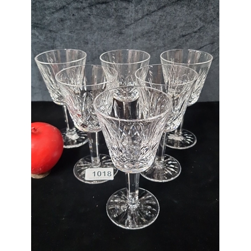 1018 - Six Waterford crystal wine glasses, featuring a classic cut pattern with acid mark to base