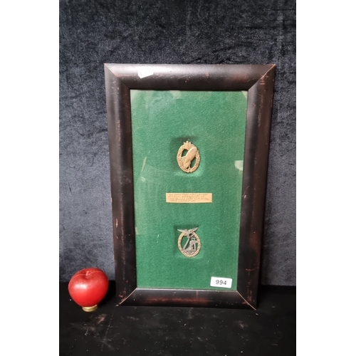 994 - A framed display of two World War II Luftwaffe sea battle badges. These badges were awarded to crews... 