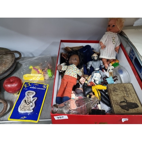 997 - An assorted vintage toys including dolls, figurines, action figures, a boxed E.T. jumbo eraser, glas... 